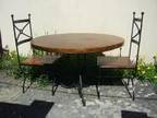 CIRCULAR WOODEN table and 4 matching chairs Heavy duty....